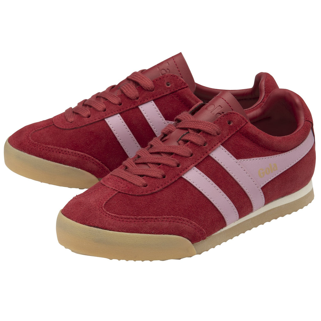 A pair of red Gola sneakers with light pink stripes on the side and a tan sole.