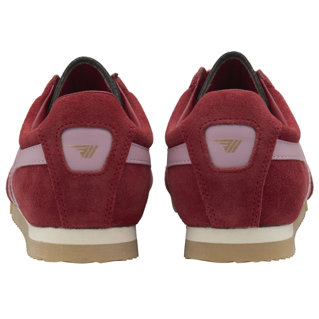 Rear view of a pair of red Gola sneakers with a white and tan sole.