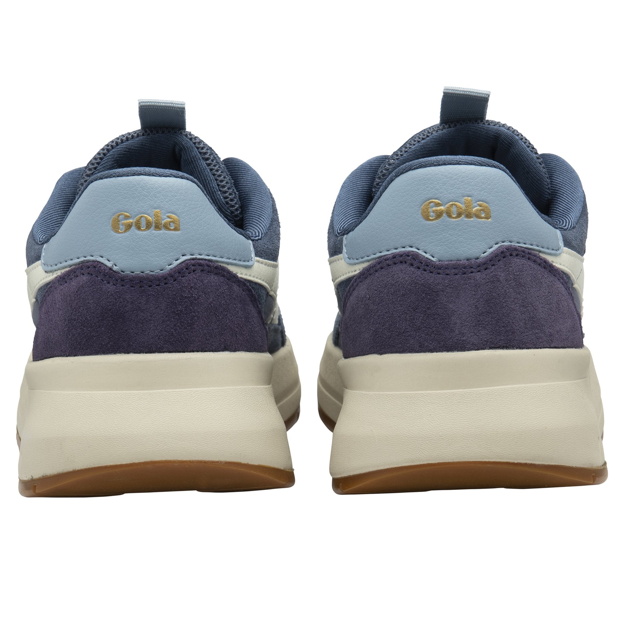 A pair of Gola women's trainers, viewed from the rear, with a navy upper and tan soles.