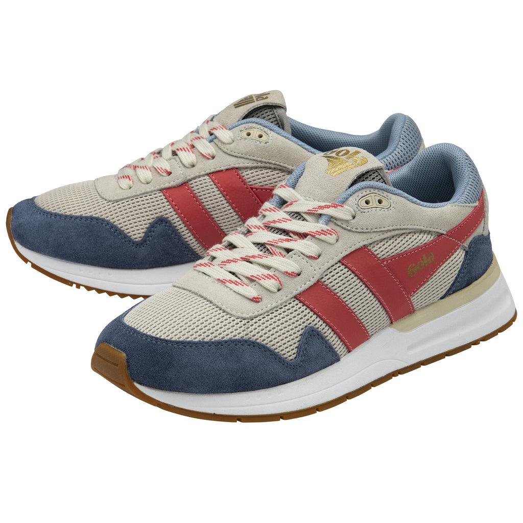 Two Gola women's trainers, in light blue, off-white, and red, are shown from an angle.