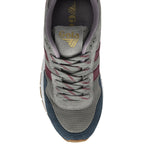 The top-down view of a single Gola women's sneaker, grey with navy and maroon accents.
