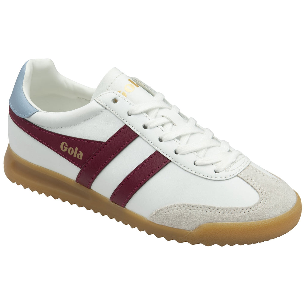 A white Gola trainer with burgundy stripes and light blue trim on the heel.