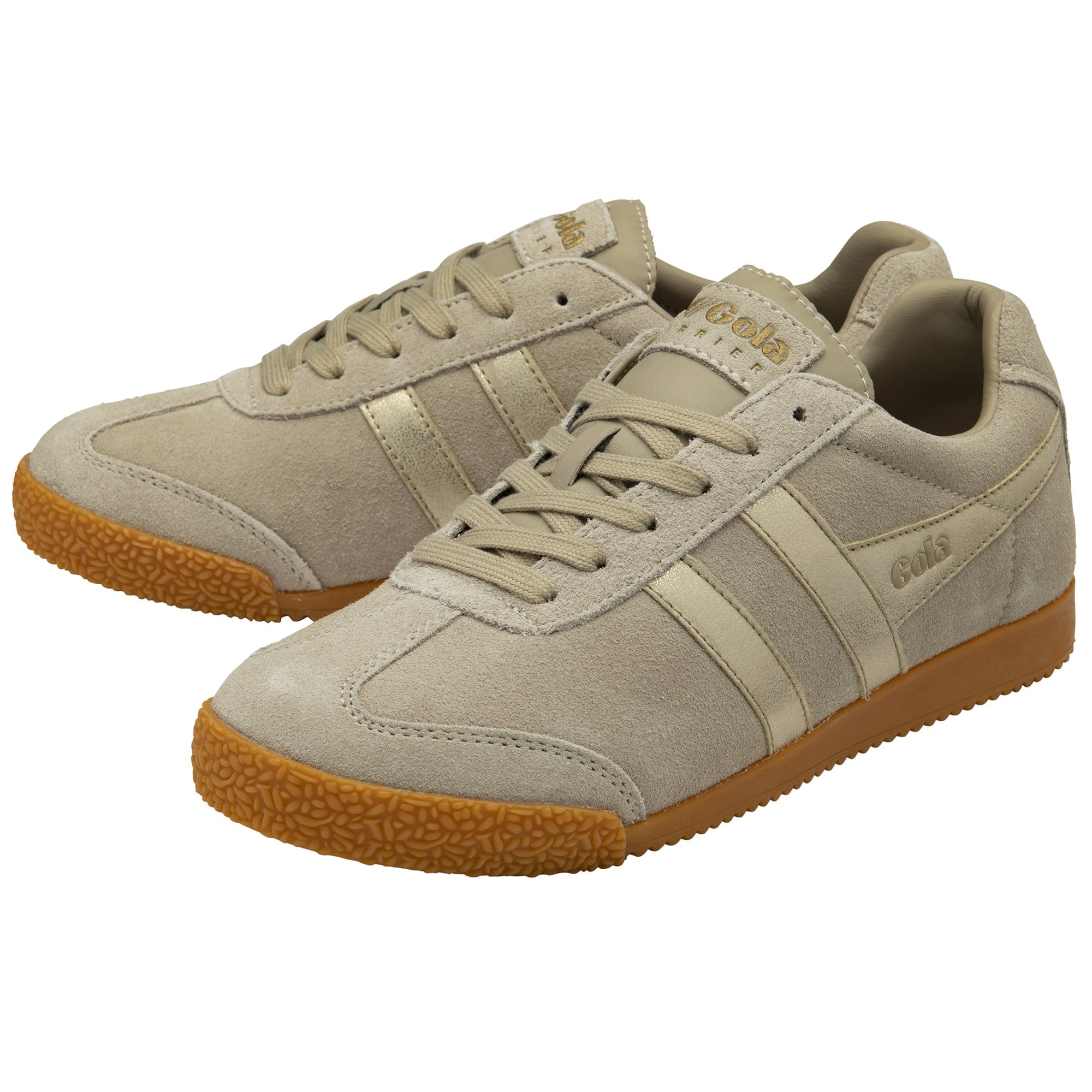 Two Gola men's Harrier Suede Trainers in light khaki, with three stripes, angled view.
