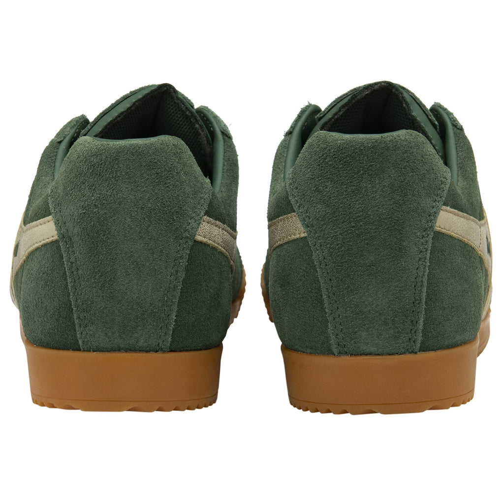 Back view of a pair of Gola Harrier suede trainers in dark green with gum soles.