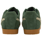 Back view of a pair of Gola Harrier suede trainers in dark green with gum soles.