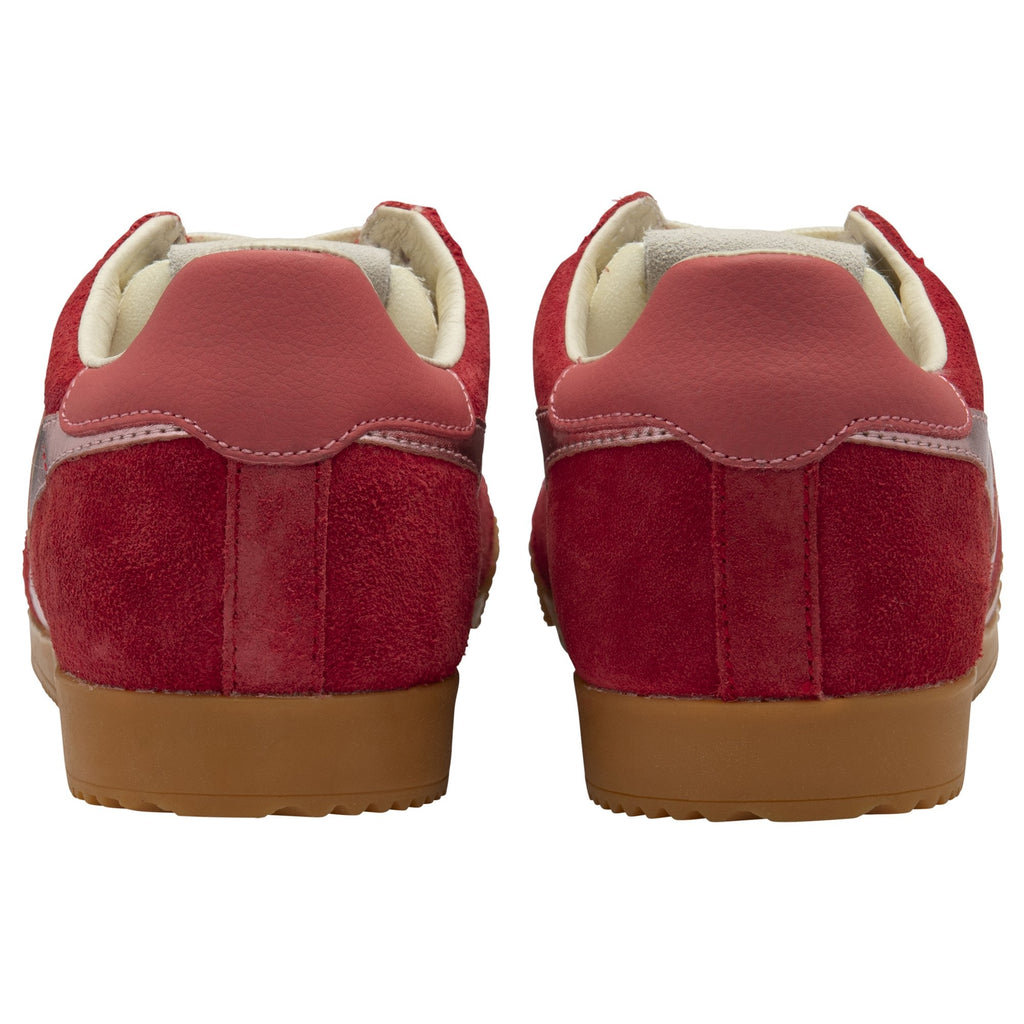 The heels of two red Gola trainers with tan soles, showing the textured finish.