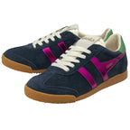 A pair of Gola low-top sneakers in dark blue suede, with gum soles and fuchsia side stripes.
