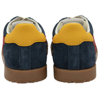 Rear view of two navy blue suede sneakers with yellow heel tabs and brown rubber soles