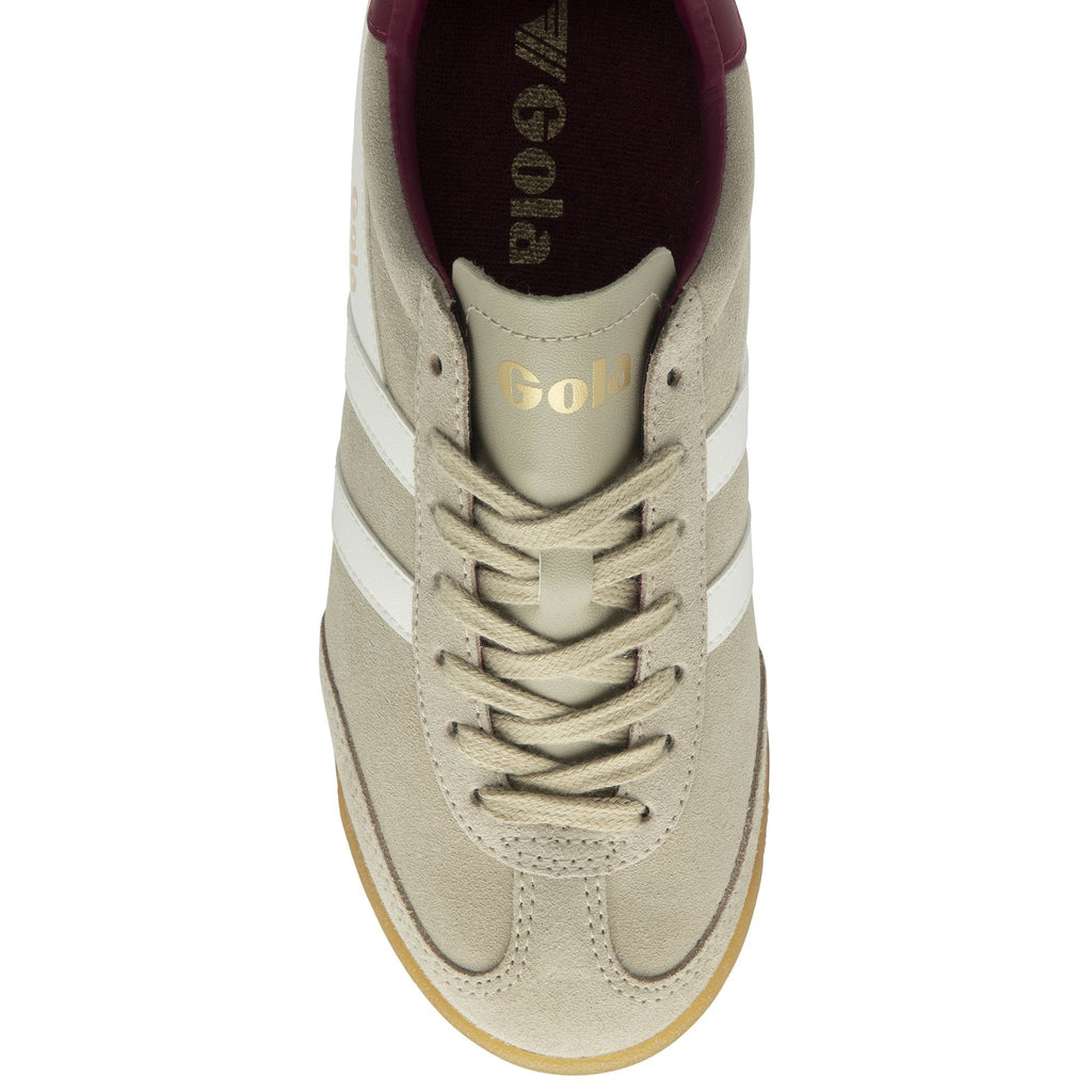 Top-down view of a single Gola men's sneaker in tan with white stripes.