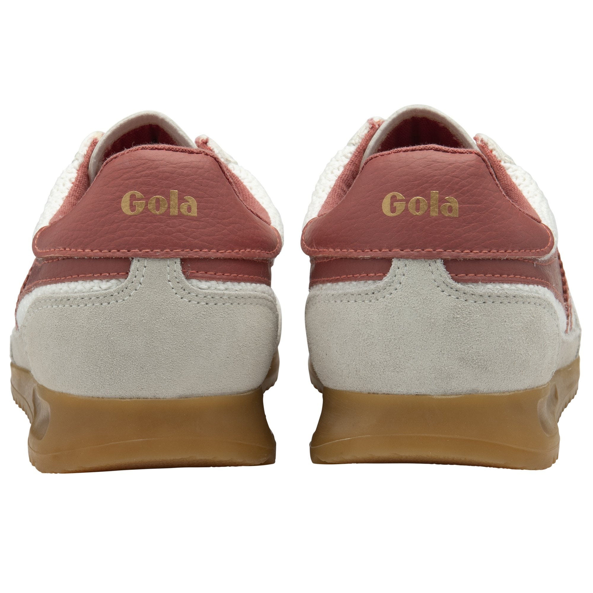 Rear view of two white Gola sneakers with red heels and gum soles.