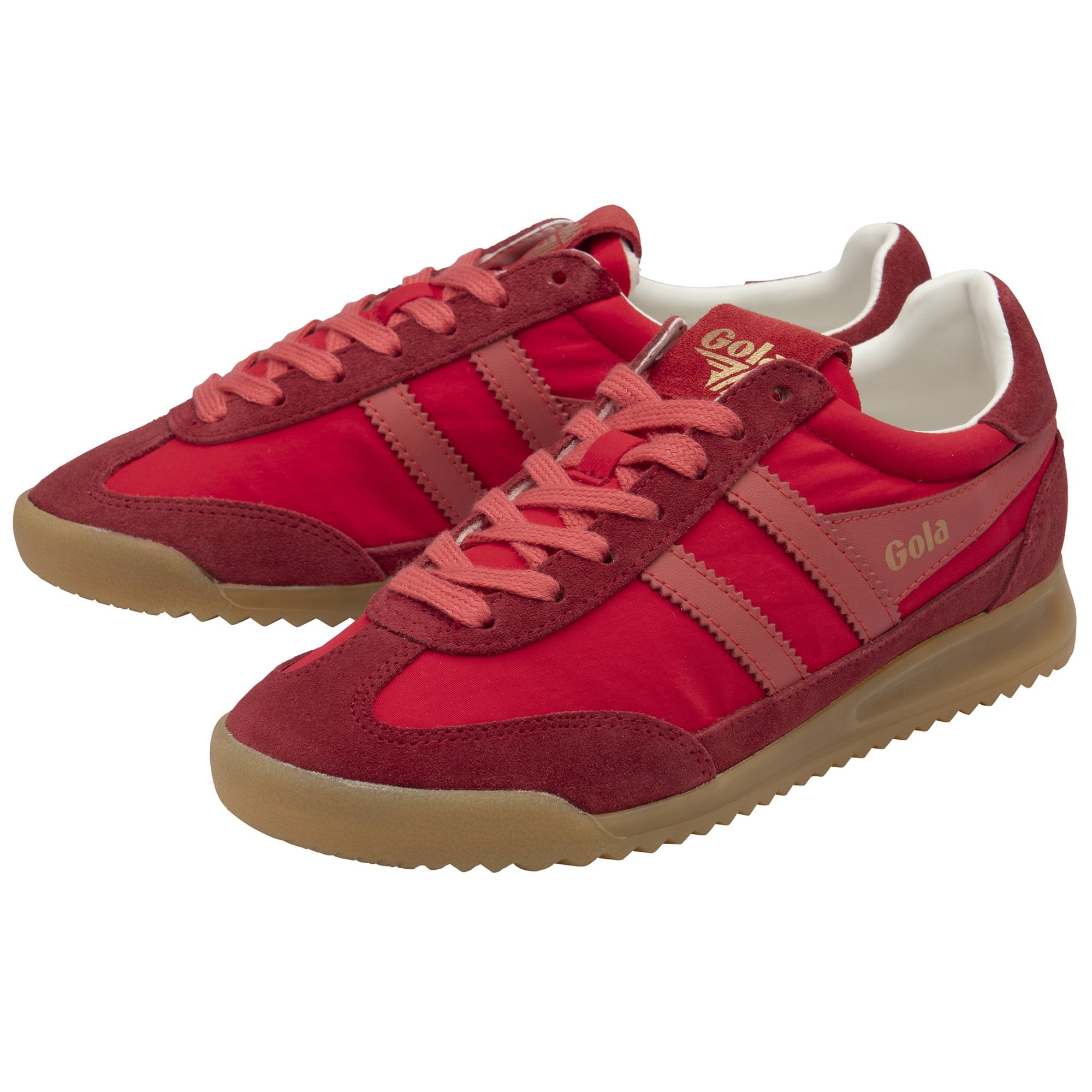 A pair of red Gola sneakers with light red stripes and tan soles, angled together.