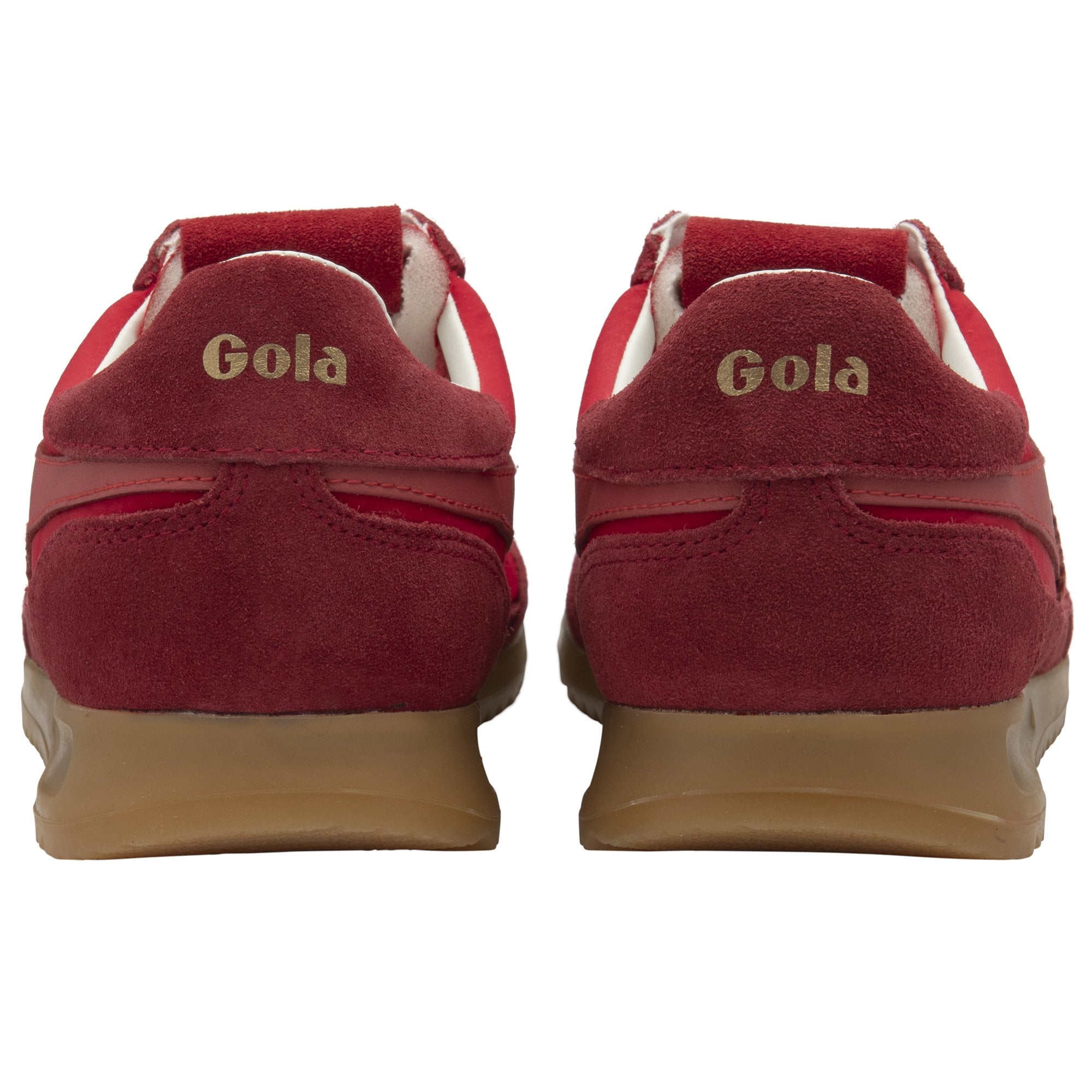 The back view of a pair of red Gola sneakers, showing the Gola logo on the heel.