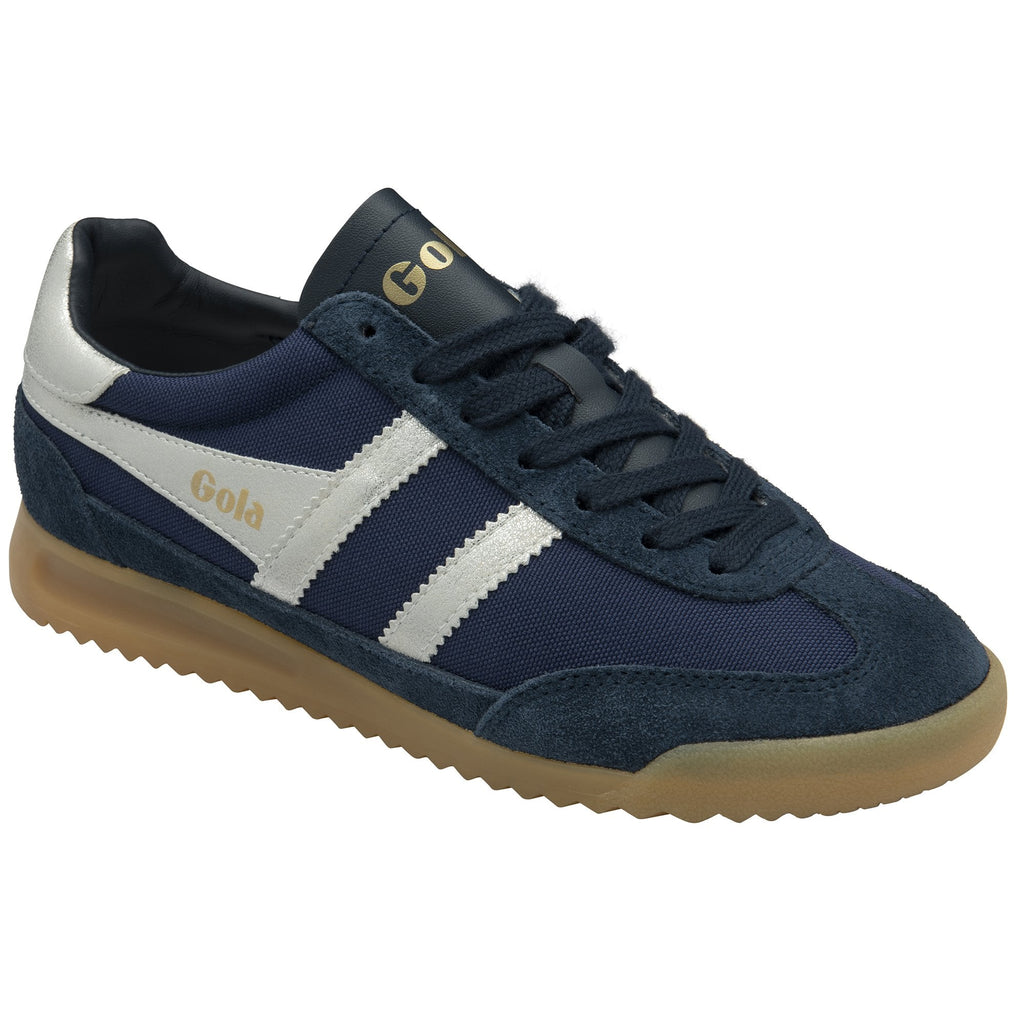 A single Gola Harrier trainer in navy with white stripes and a gum sole, viewed from the top.