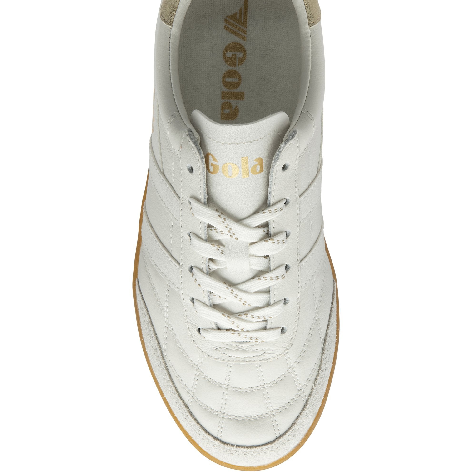 An overhead view of a white and gold Gola sneaker with a gum sole, showing the laces.