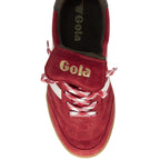 A single red Gola sneaker with white stripes and brown sole, viewed from above.