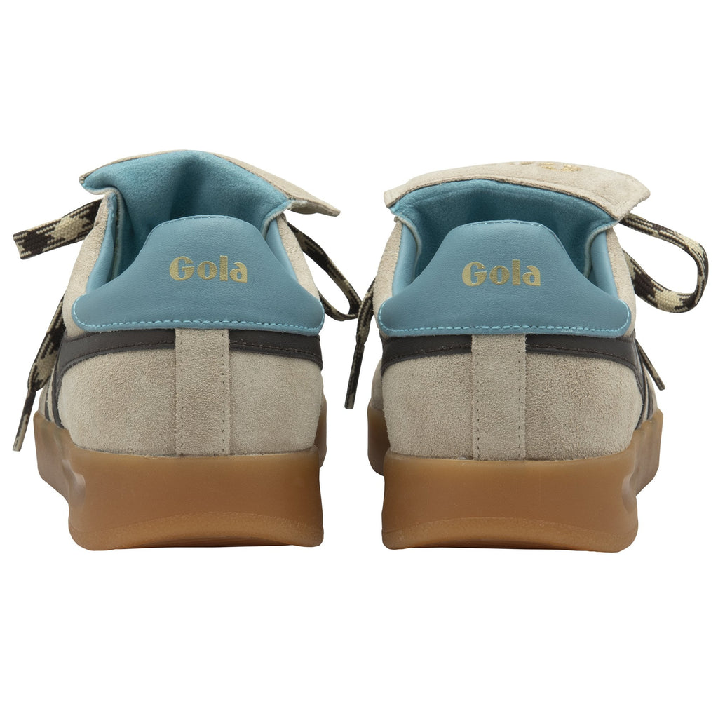 Rear view of a pair of beige Gola sneakers with blue heel accents.