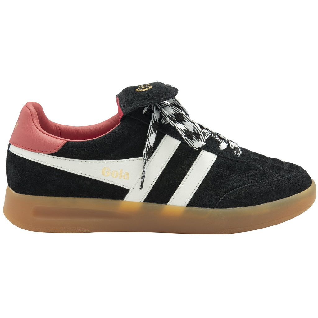 A single black Gola trainer with white stripes, a red heel accent, and a gum sole.