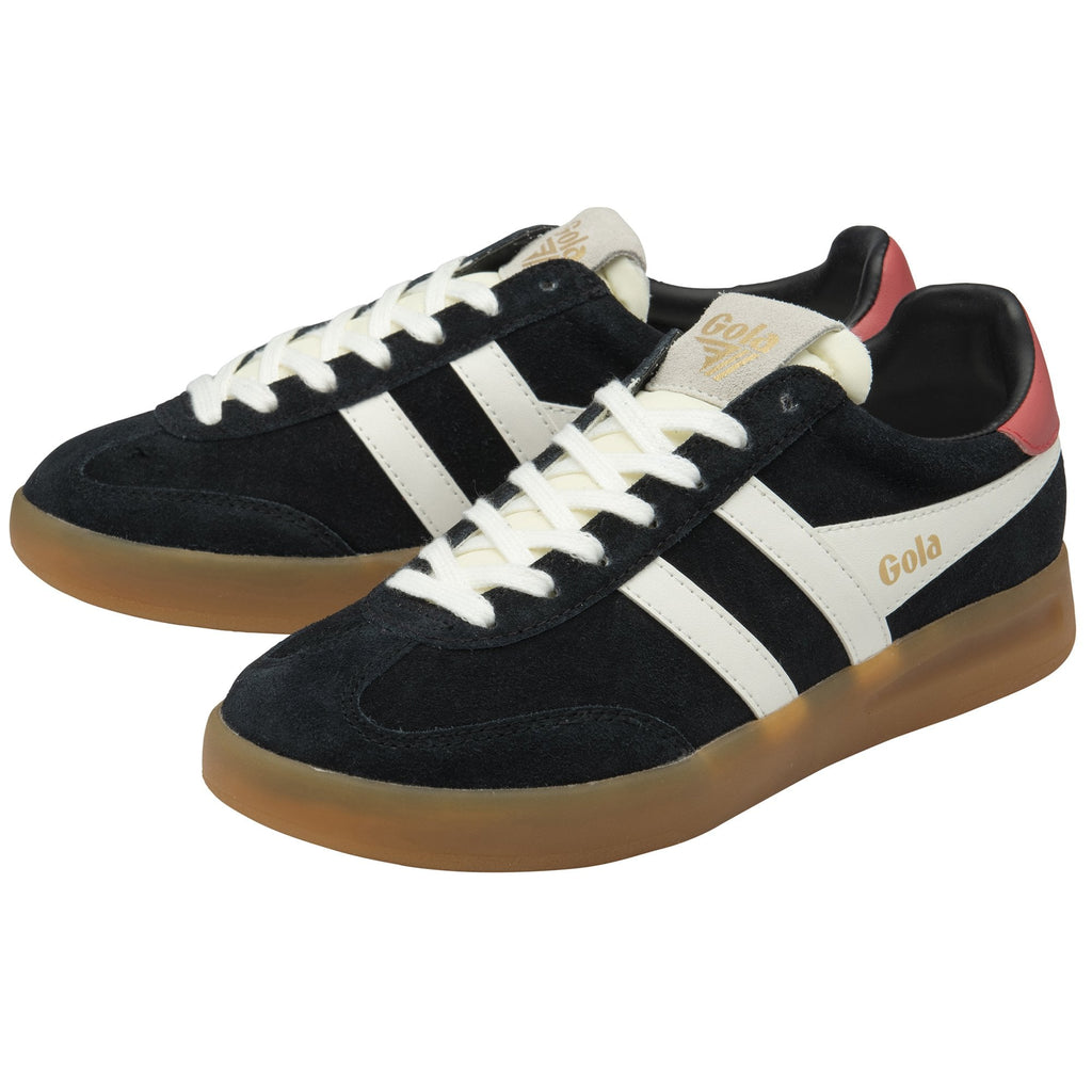 A pair of black sneakers with white stripes, red heels, and gum soles on a white background.