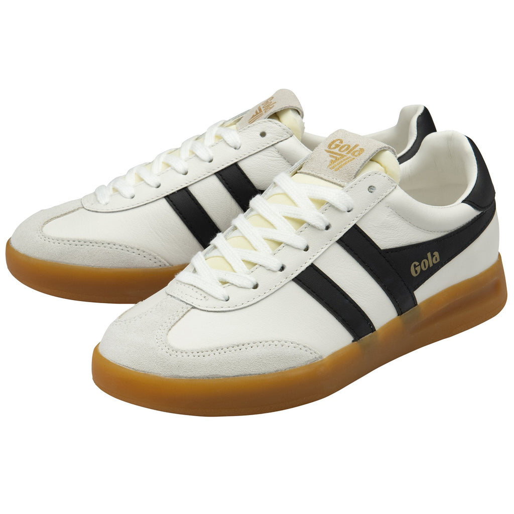 Pair of white Gola sneakers with black stripes and gum soles, angled.