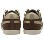 Rear view of a pair of brown Gola Bullet trainers with gold heel accents.
