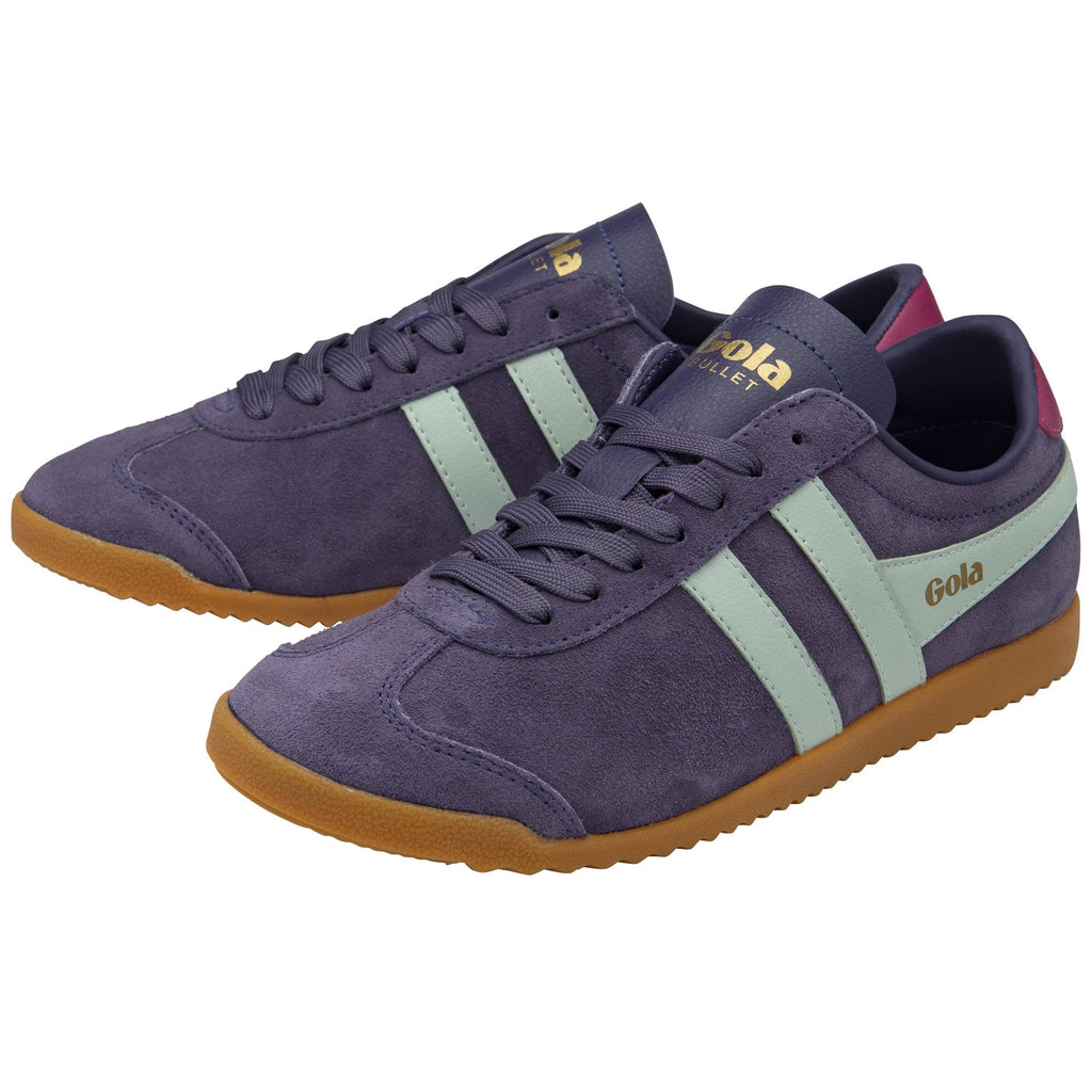 Pair of Gola Bullet sneakers in purple suede with mint green stripes.