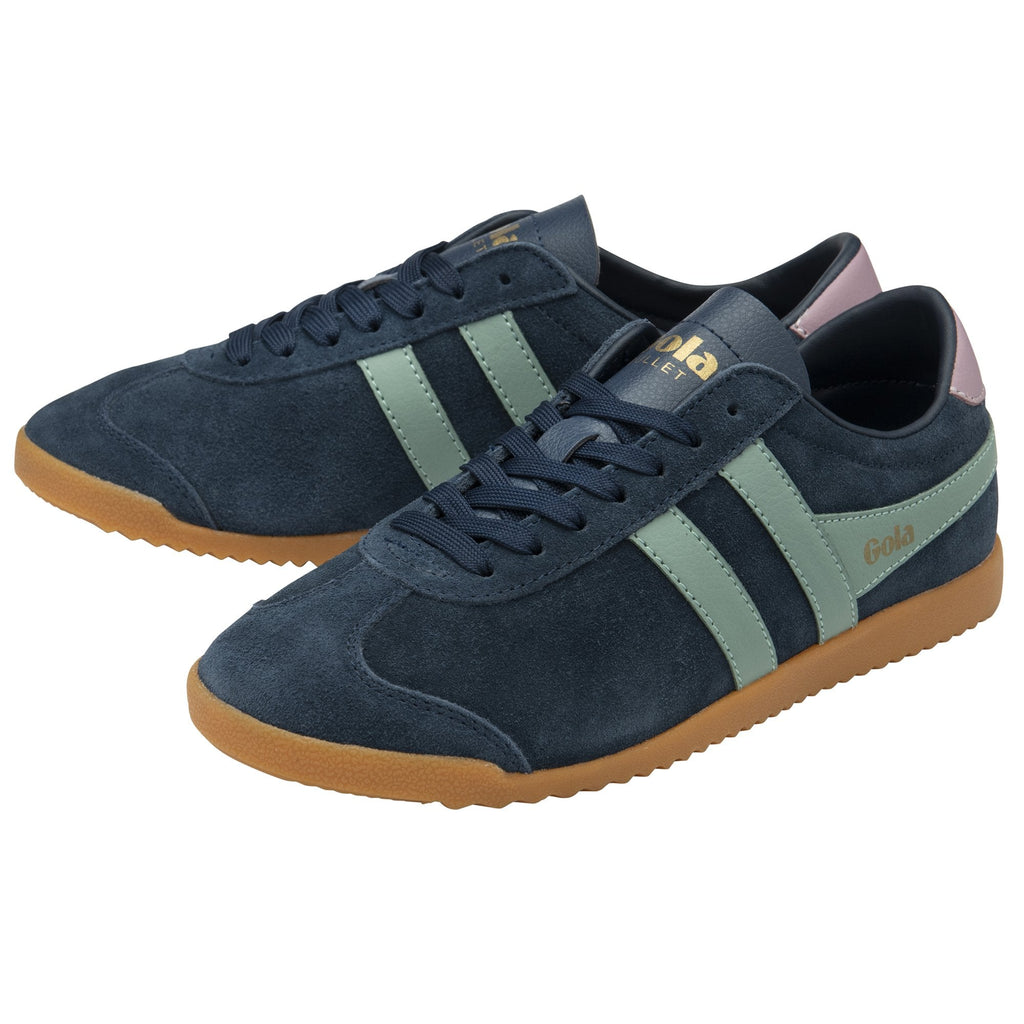 A pair of Gola Bullet Trainers in navy suede with light green stripes and gum soles.