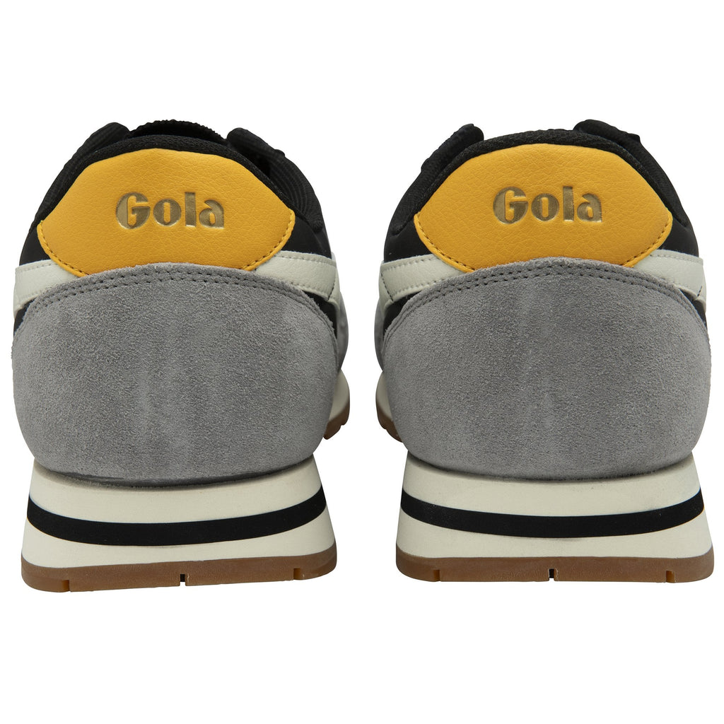 Rear view of a pair of black, white, and gray Gola sneakers, showing the yellow Gola heel tabs.