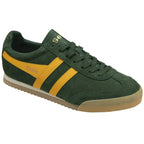 Angled view of a Gola men's trainer in dark green suede with yellow stripes and gum sole.
