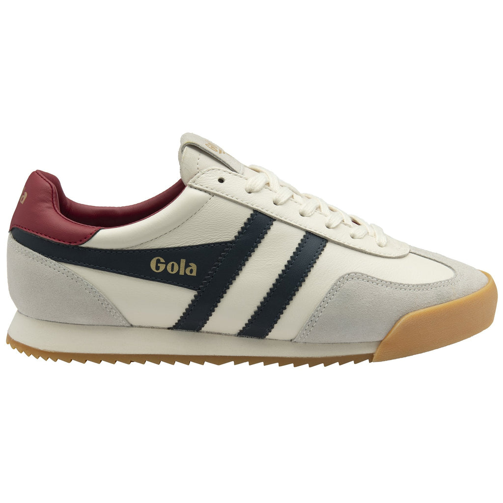 A white Gola Harrier Trainer with navy stripes, burgundy heel, and gum sole.