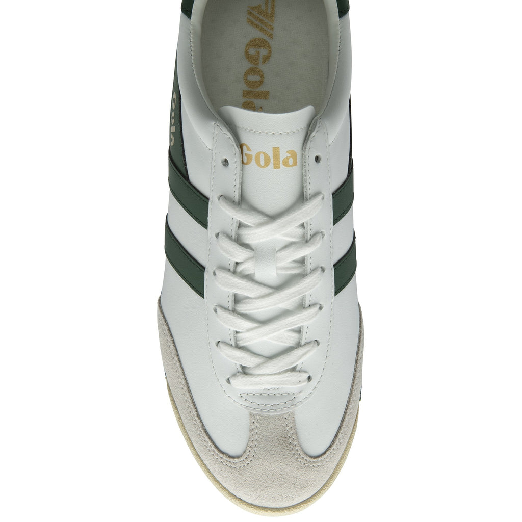 Top-down view of a white Gola sneaker with green stripes and white laces.