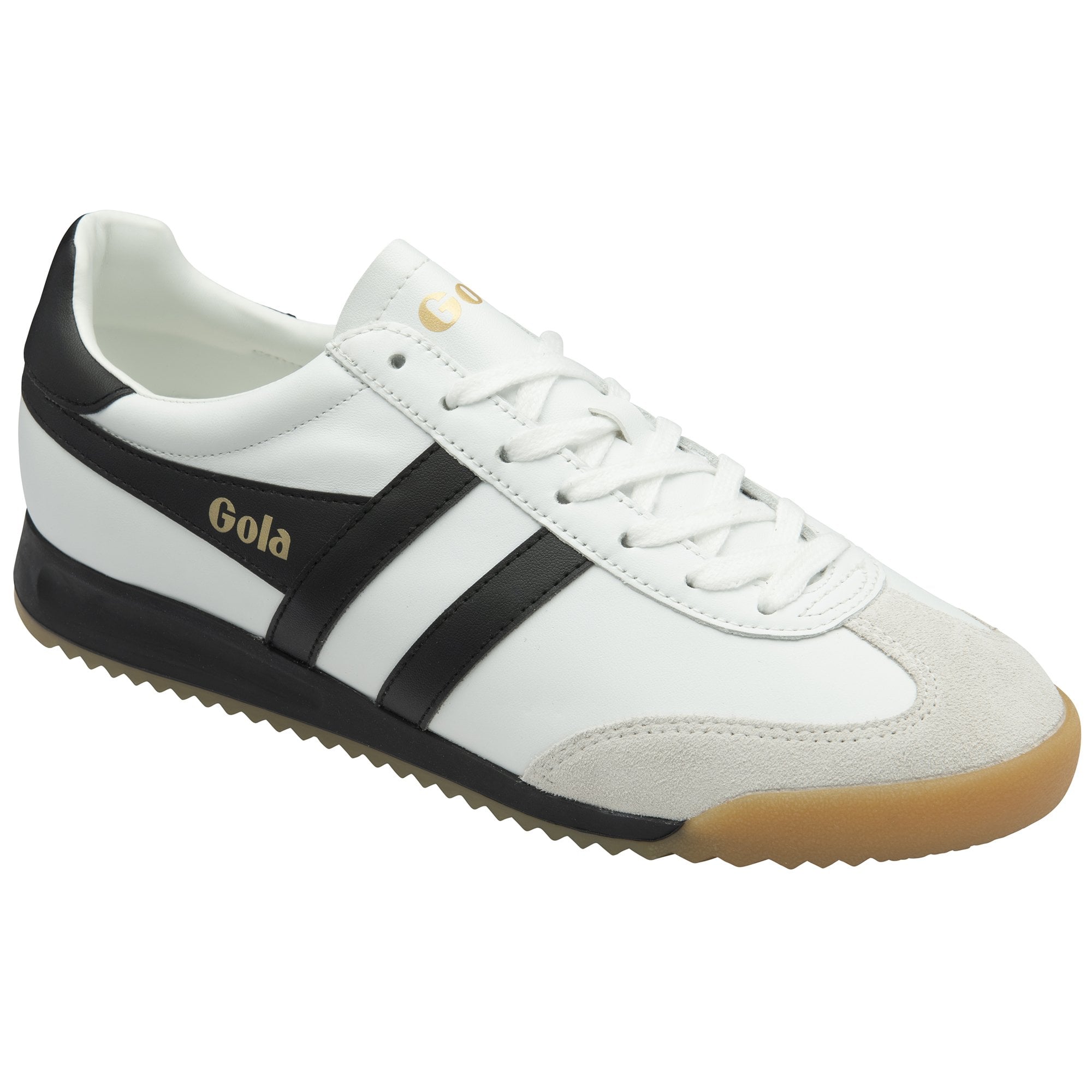Angled view of a Gola Harrier trainer in white with black stripes and a gum sole.