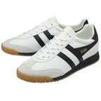 Pair of Gola Harrier trainers in white with black stripes and gum soles.