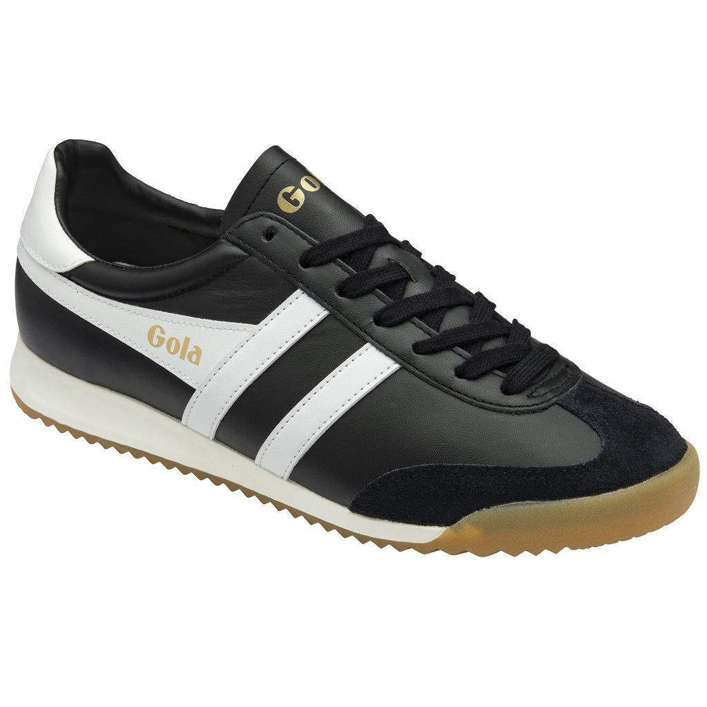 A black Gola men's sneaker with white stripes and a gold logo on the tongue.