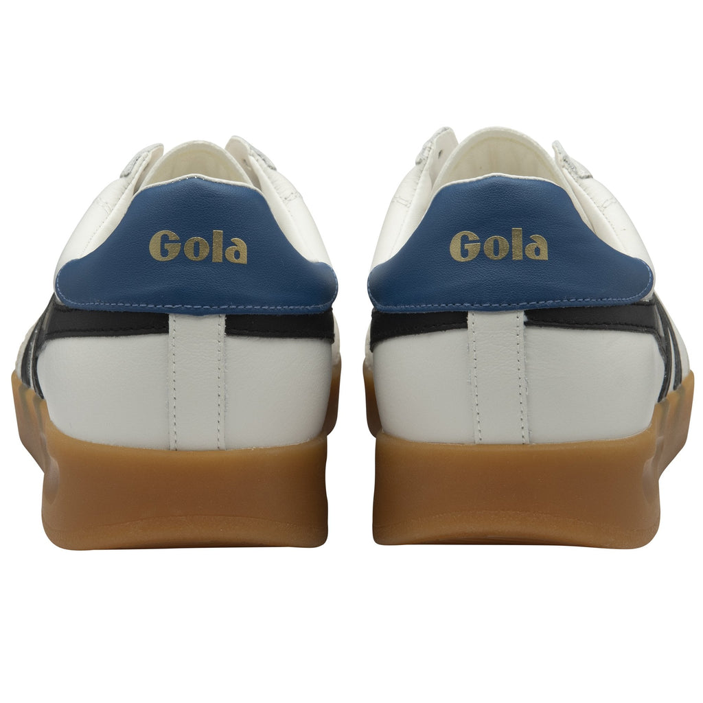 The back view of two Gola sneakers, showing blue heels with gold branding.