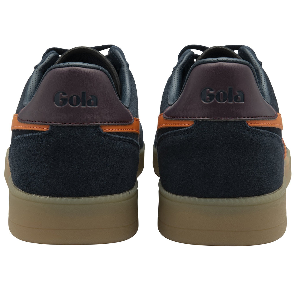Pair of Gola sneakers, navy blue with orange accents and gum soles, rear view