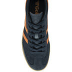 A single Gola trainer, top down view, dark blue with orange stripes.