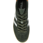 The top-down view of a single green Gola men's sneaker with white stripes.
