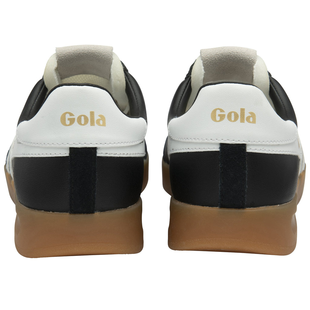 The back view of two Gola Daytona trainers with white heels and gum soles.