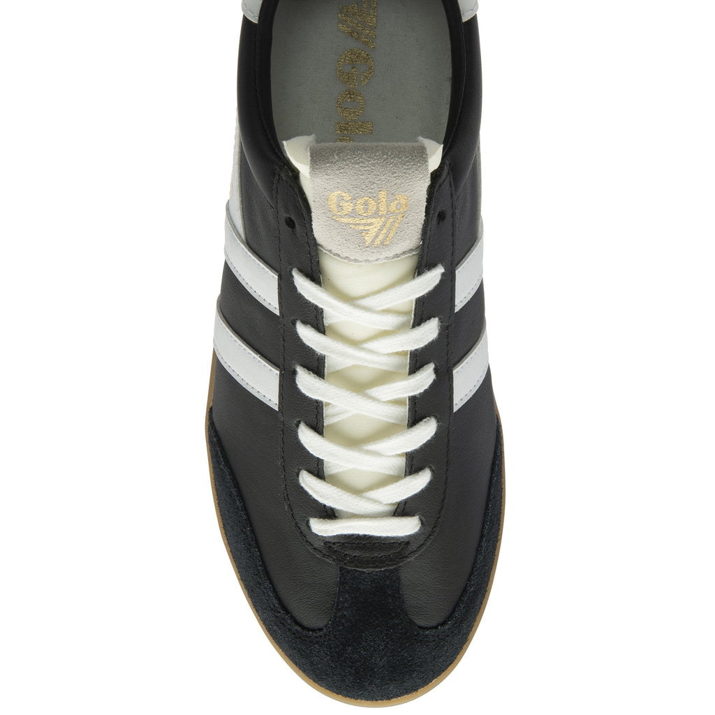 Top-down view of a black Gola Daytona trainer with white stripes and laces.