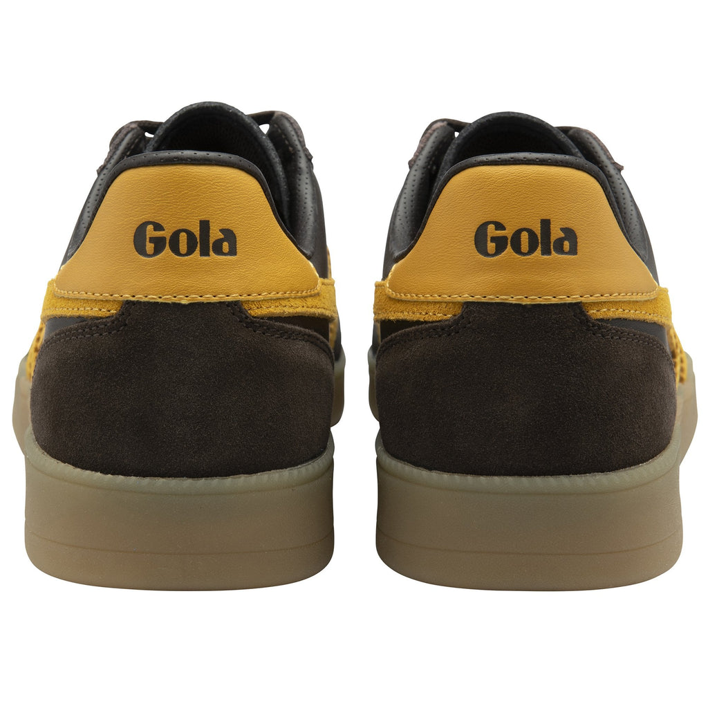 Rear view of two brown Gola men's sneakers with yellow trim.