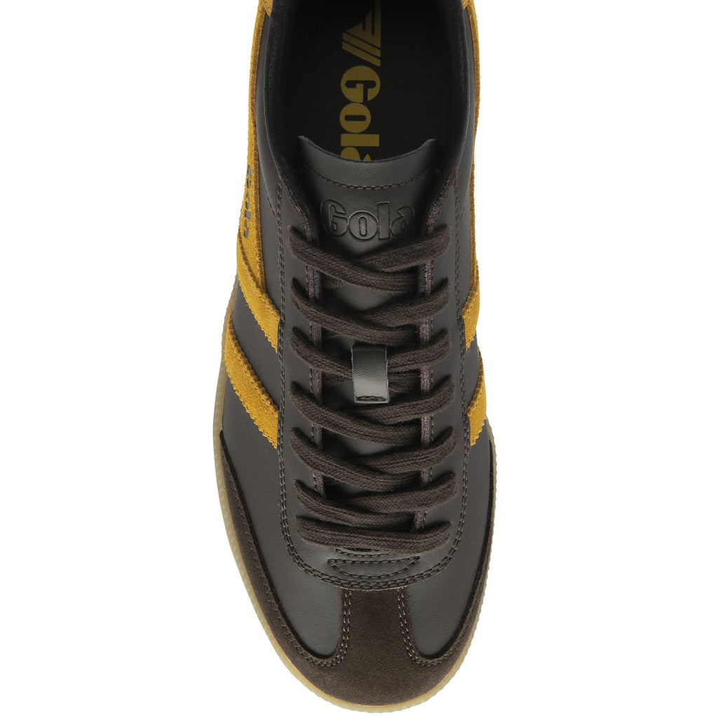 Overhead view of a brown Gola men's sneaker with yellow side stripes.