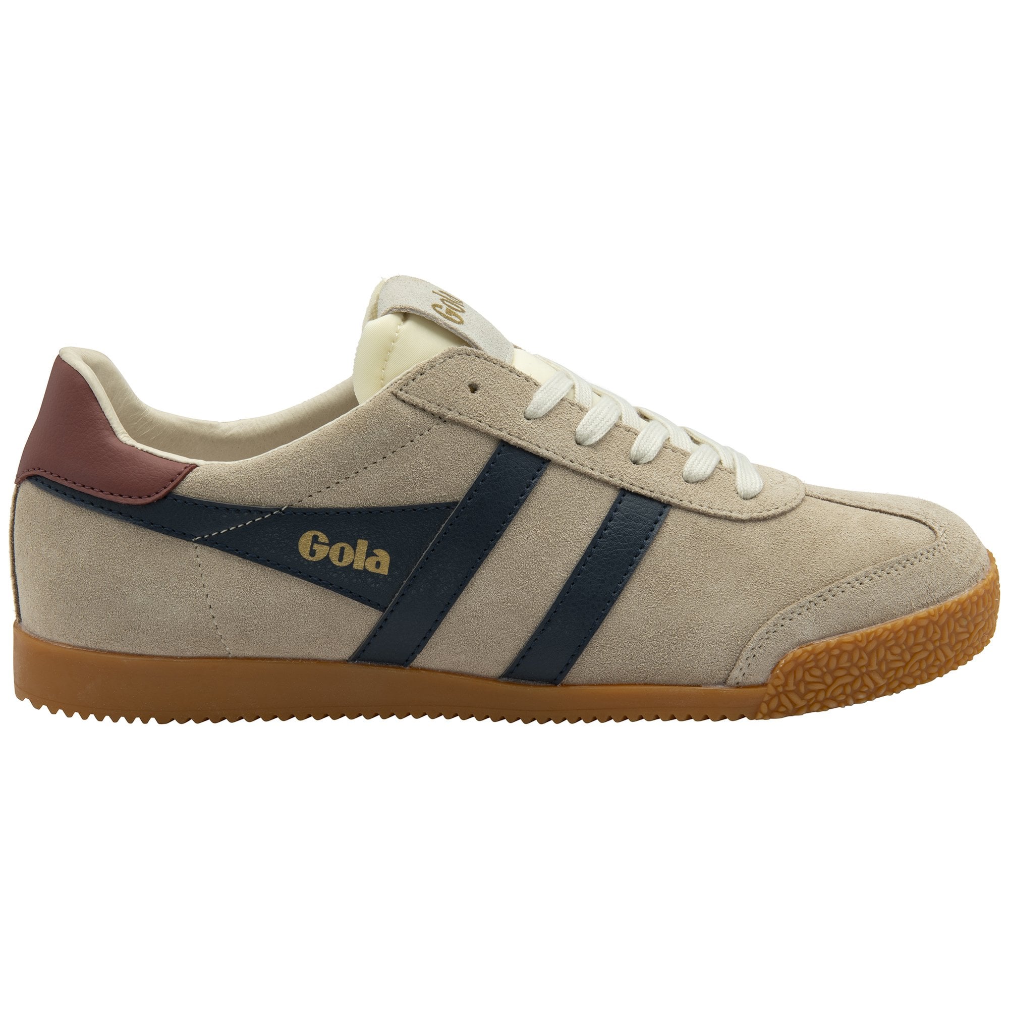 A single Gola Harrier trainer in beige with navy stripes, viewed from a slightly elevated side angle.