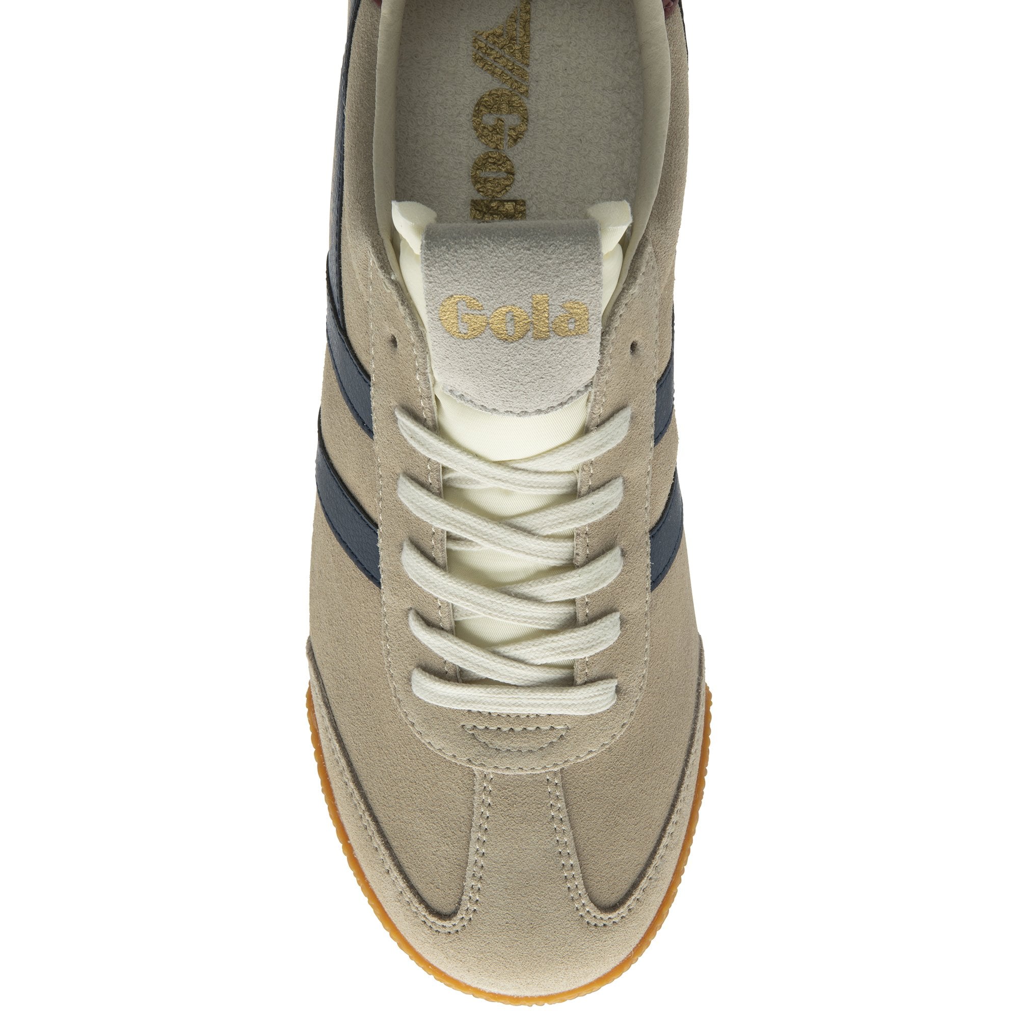 The top-down view of a Gola Harrier trainer in beige with navy stripes and cream laces.