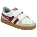 A right white sneaker with two red stripes and two velcro straps. The sole is brown.