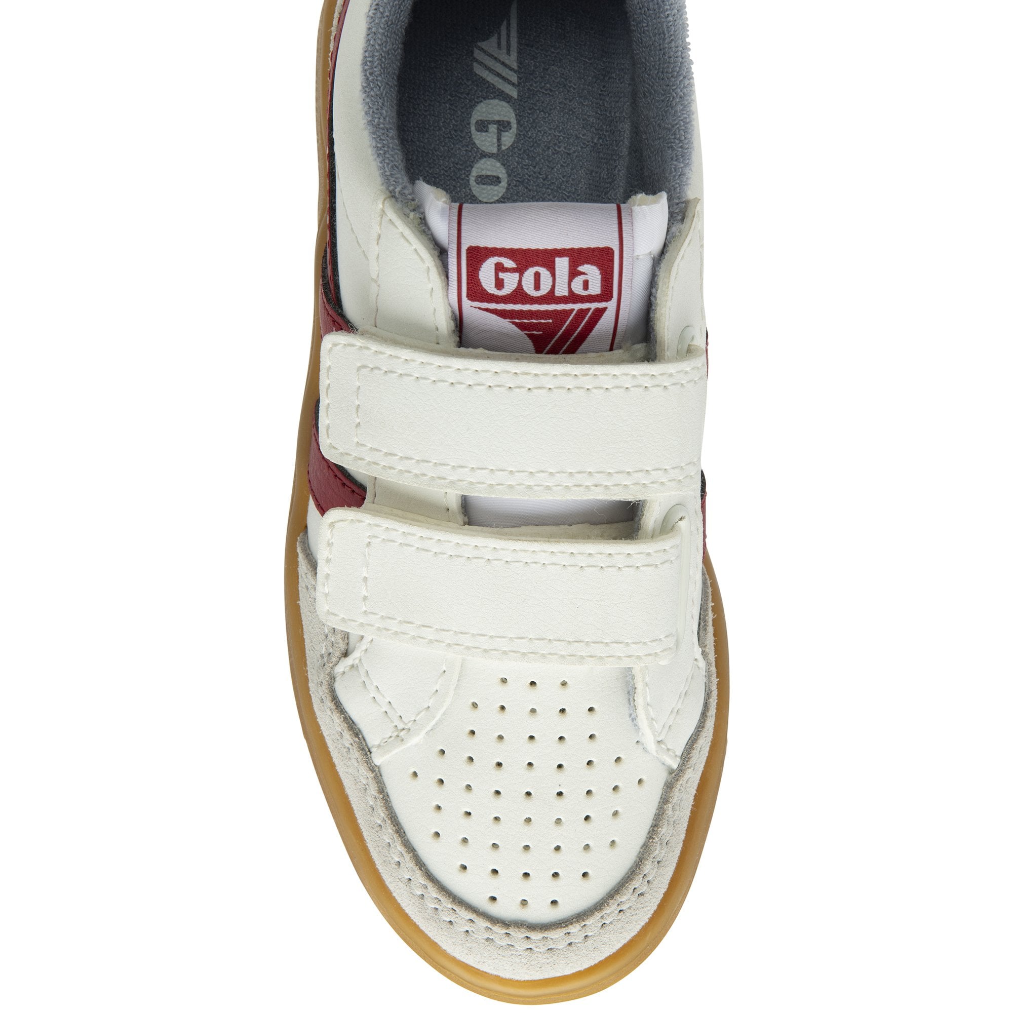 The front of a white sneaker with two red stripes and two velcro straps. The sole is brown.
