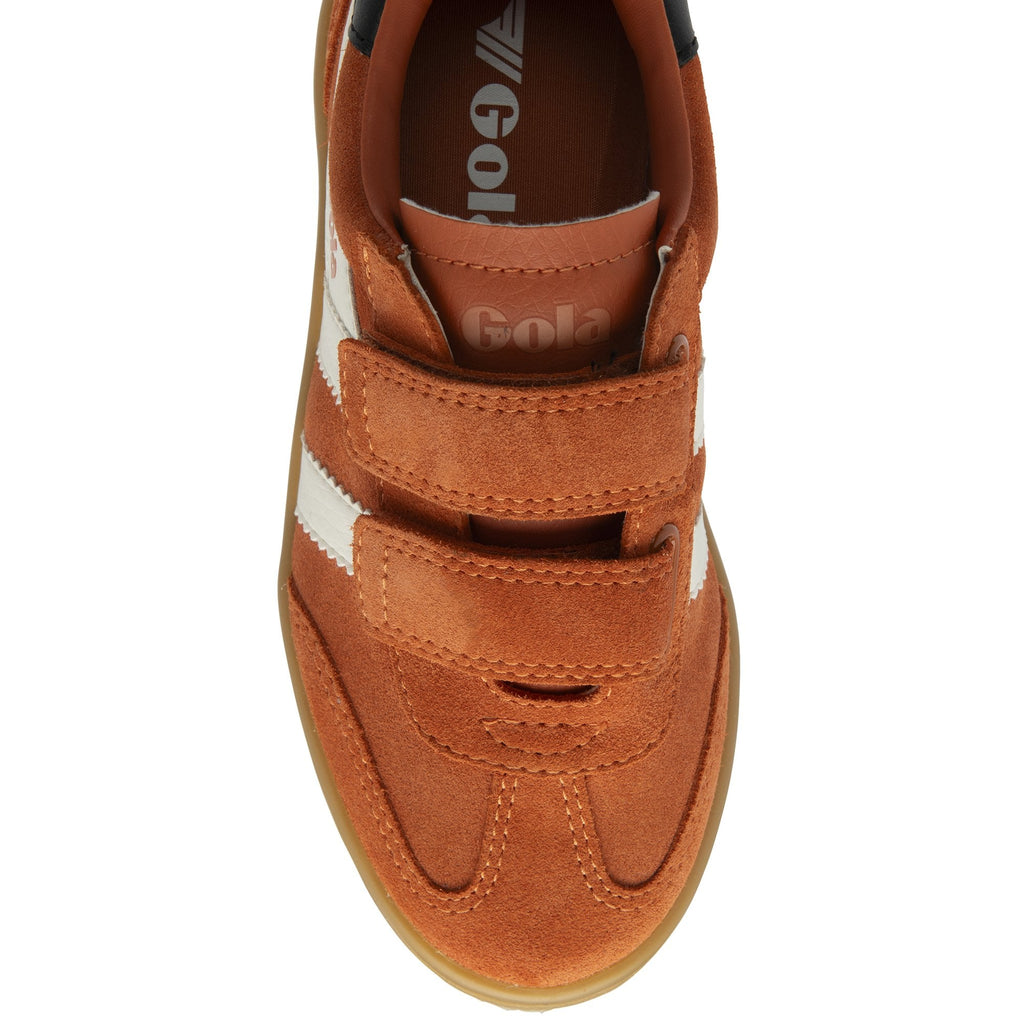Top-down view of a single Gola kids' Velcro sneaker in tan with white stripes.