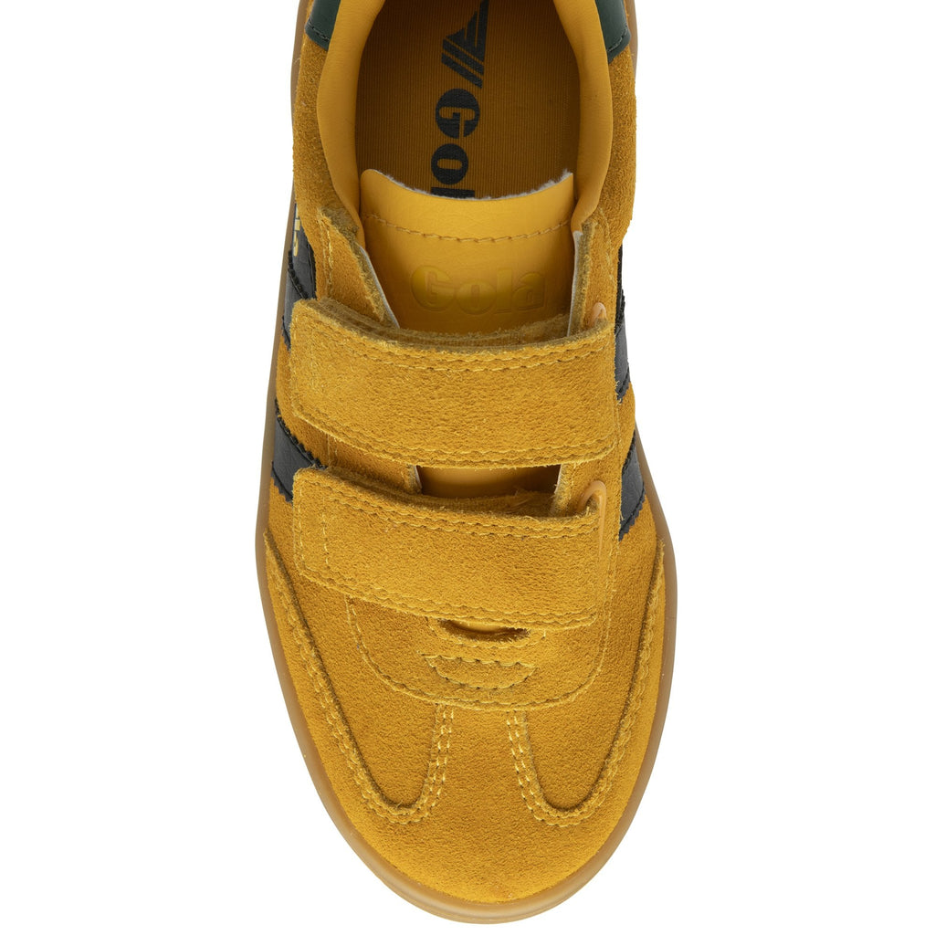 The top-down view of a yellow Gola kids' sneaker, highlighting the two velcro straps.