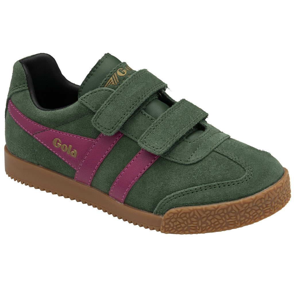 A single green Gola sneaker with fuchsia stripes and Velcro straps, viewed from an angle.