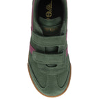 The top-down view of a single green Gola sneaker with fuchsia stripes and Velcro straps.