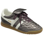 Right metallic grey Gola trainer with white stripes and brown sole from an angle.